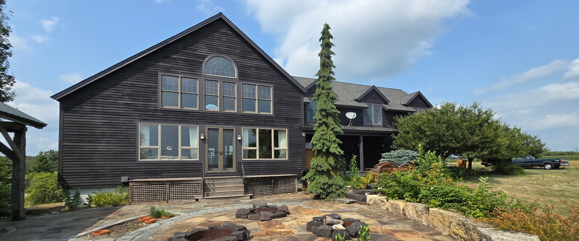 Black Wood Siding Maintenance on a Dayton Farmhouse